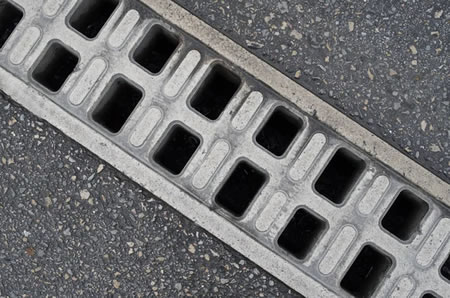 Driveway Drainage Solutions That Prevent Flooding and Foundation Damage